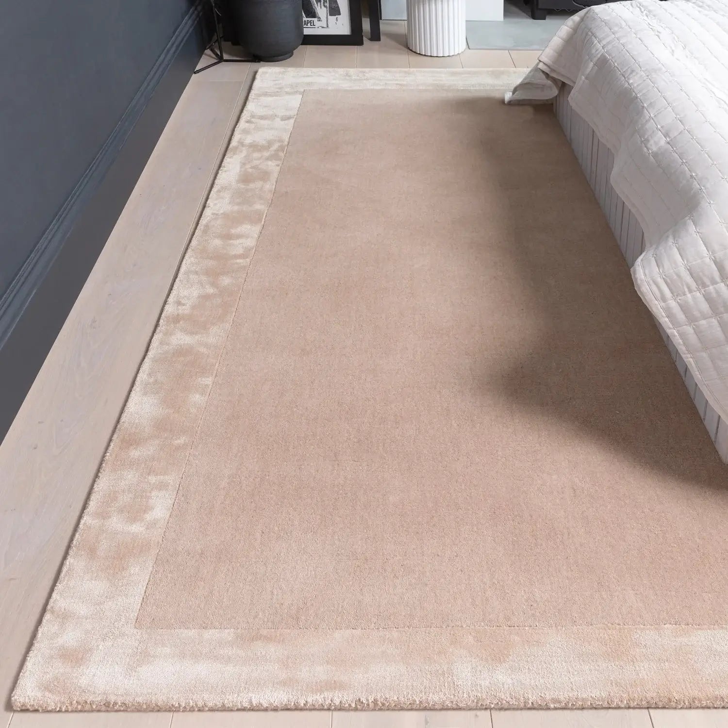tufted wool rug in bedroom