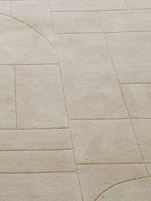 close up of beige wool rug