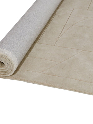 beige tufted wool rug