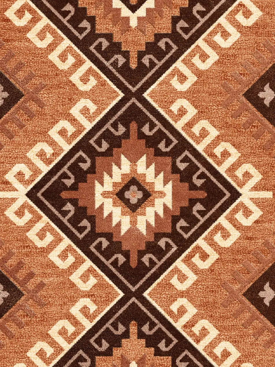 Close-up of a patterned rug with geometric design