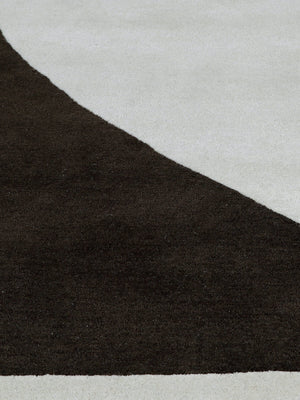 Close-up of a black and gray rug