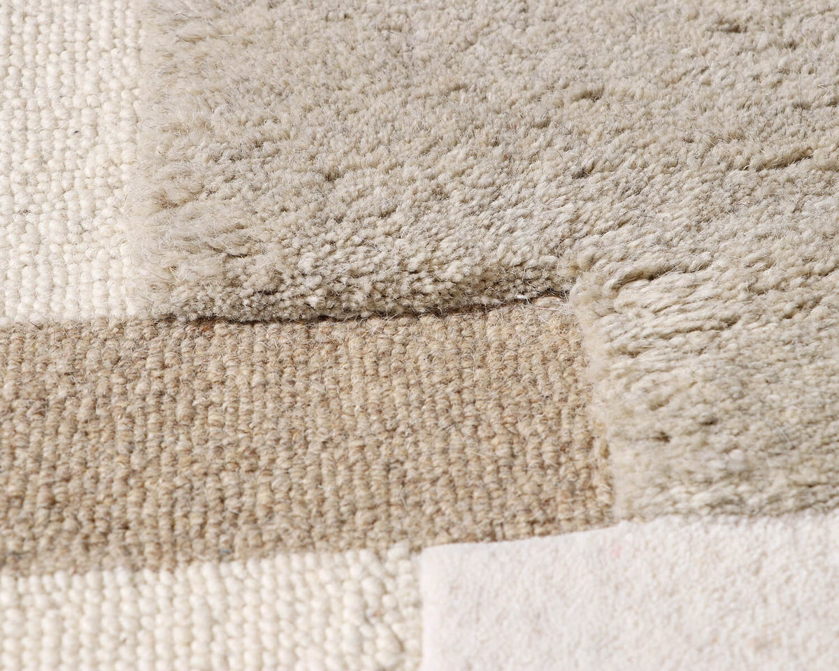 close up of grida tufted wool area rug