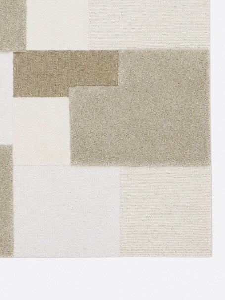 Geometric patterned wool rug close up