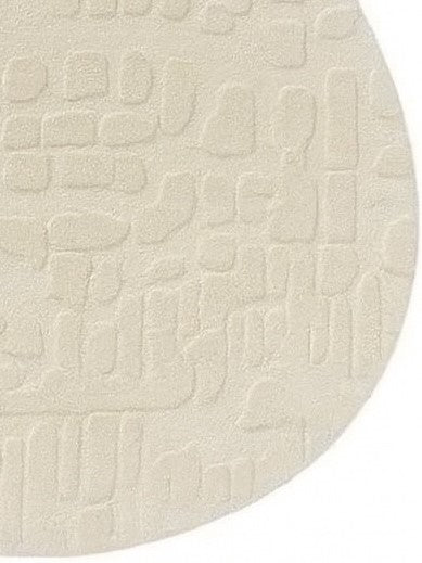 beige shaped wool rug