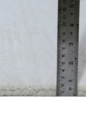 tufted wool rug pile height