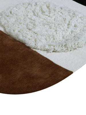 Close-up of a brown and white rug corner