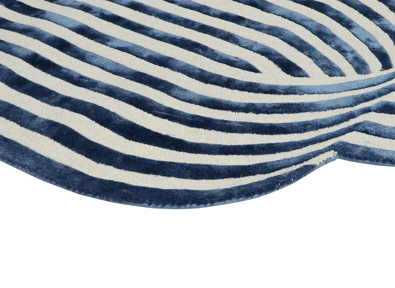 Close-up of a blue and white striped area rug