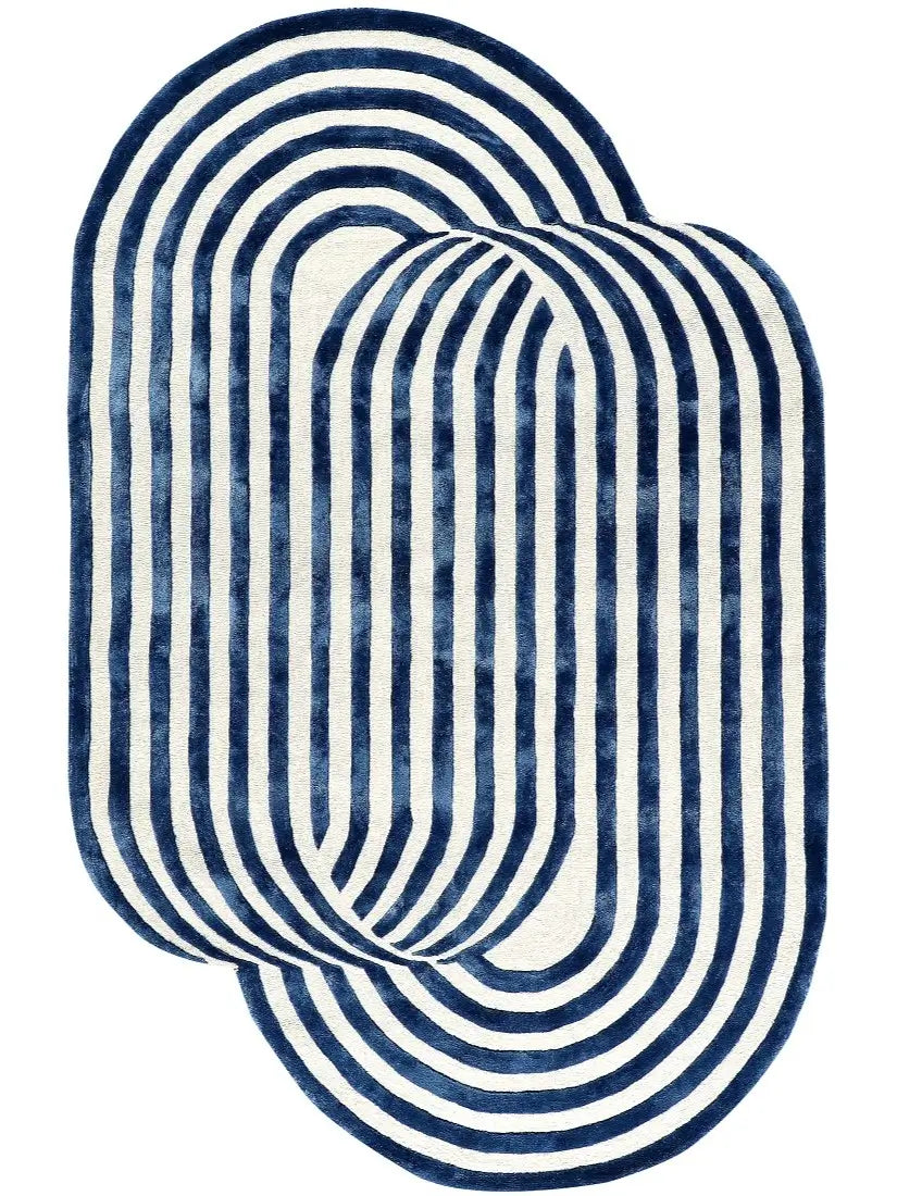 hand tufted oval-shaped rugs with blue and white striped pattern