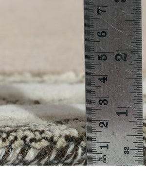 tufted wool rug pile height