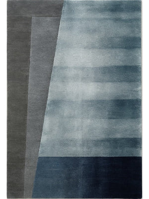 hand tufted wool and viscose rug in gray to blue gradient style