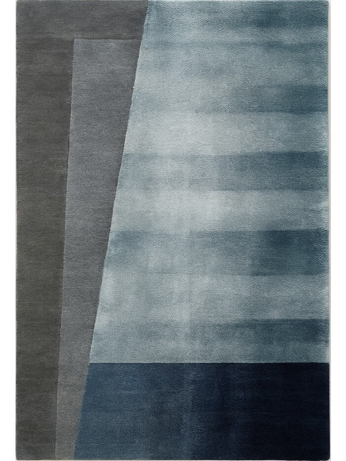 hand tufted wool and viscose rug in gray to blue gradient style