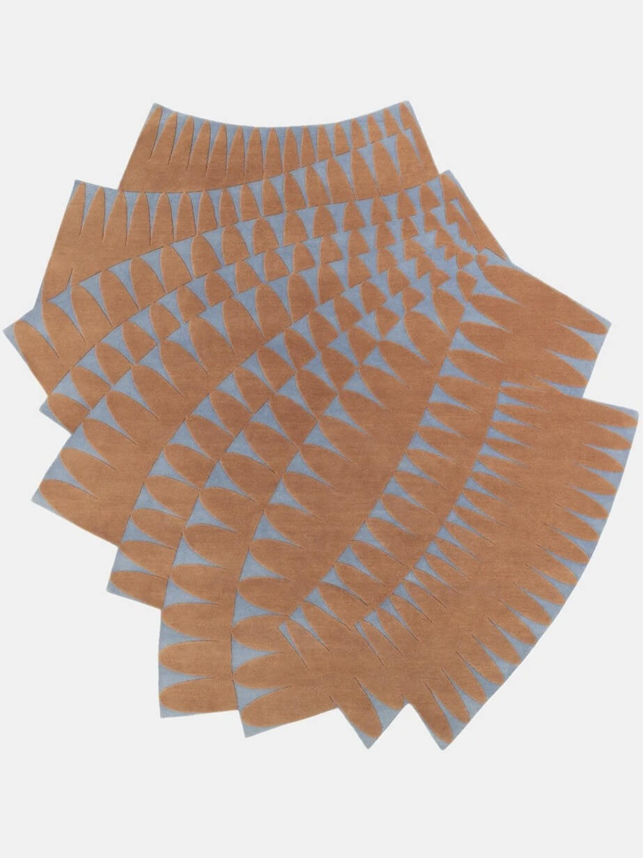 geometric pattern hand tufted shaped rug, made with NZ wool