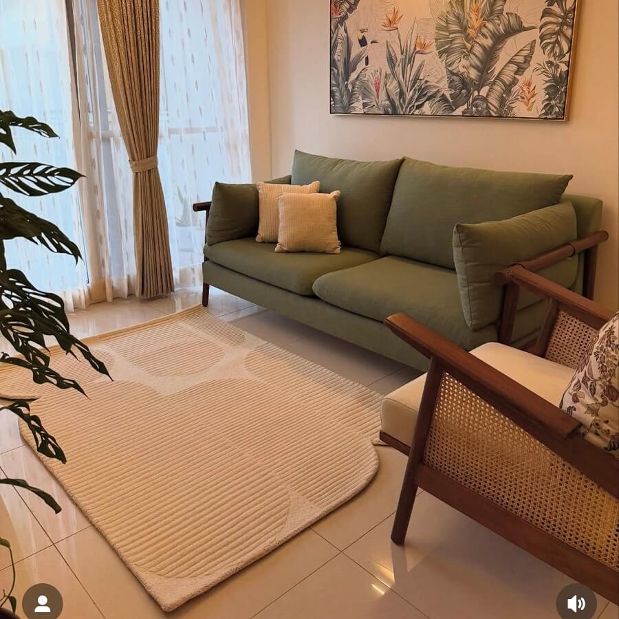 small tufte beige wool rug in living room