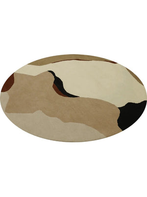 tufted round rug in beige