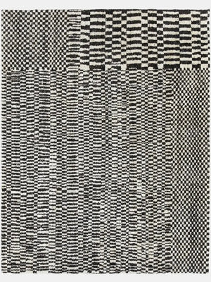 Black and white geometric patterned hand tufted wool rug