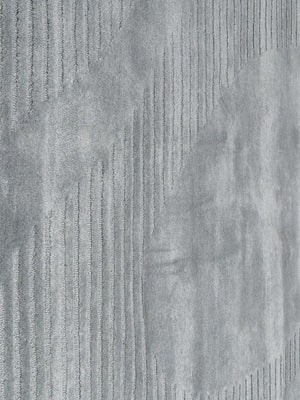 Close-up of textured gray wool rug