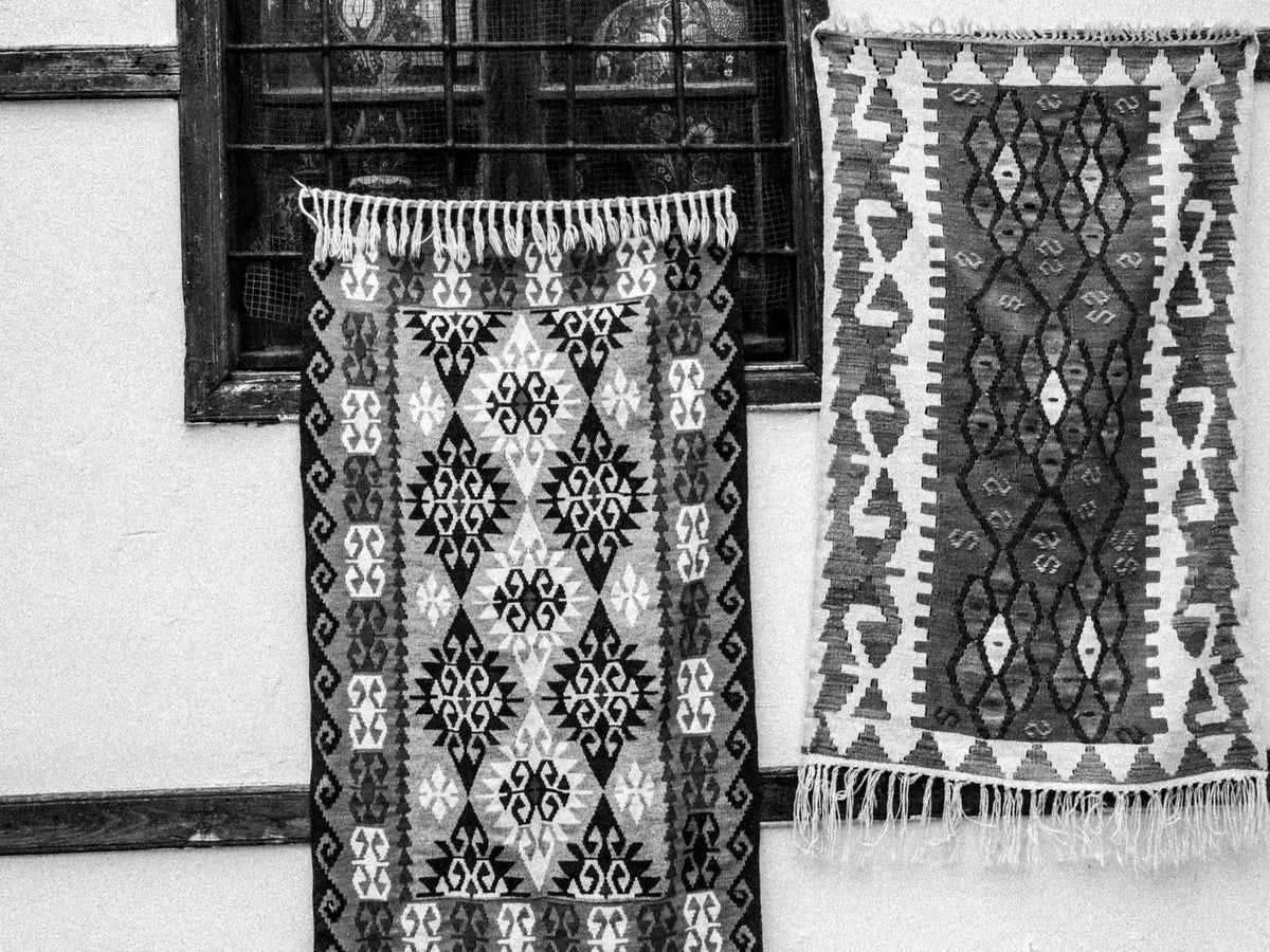 two traditional handmade area rugs