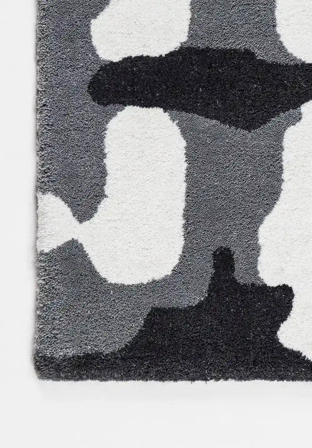 hand tufted wool rug corner close up