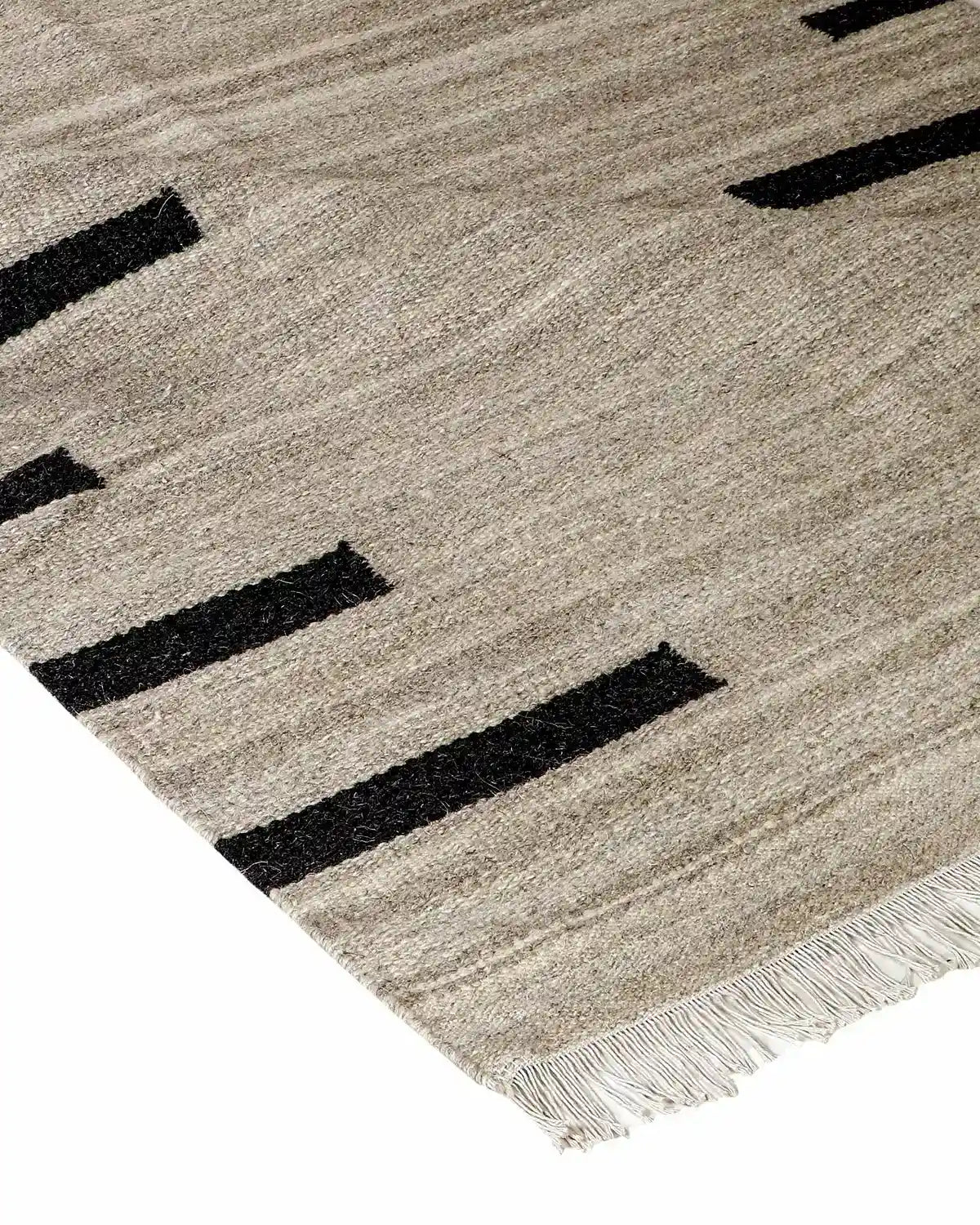 A close-up of a woven area rug