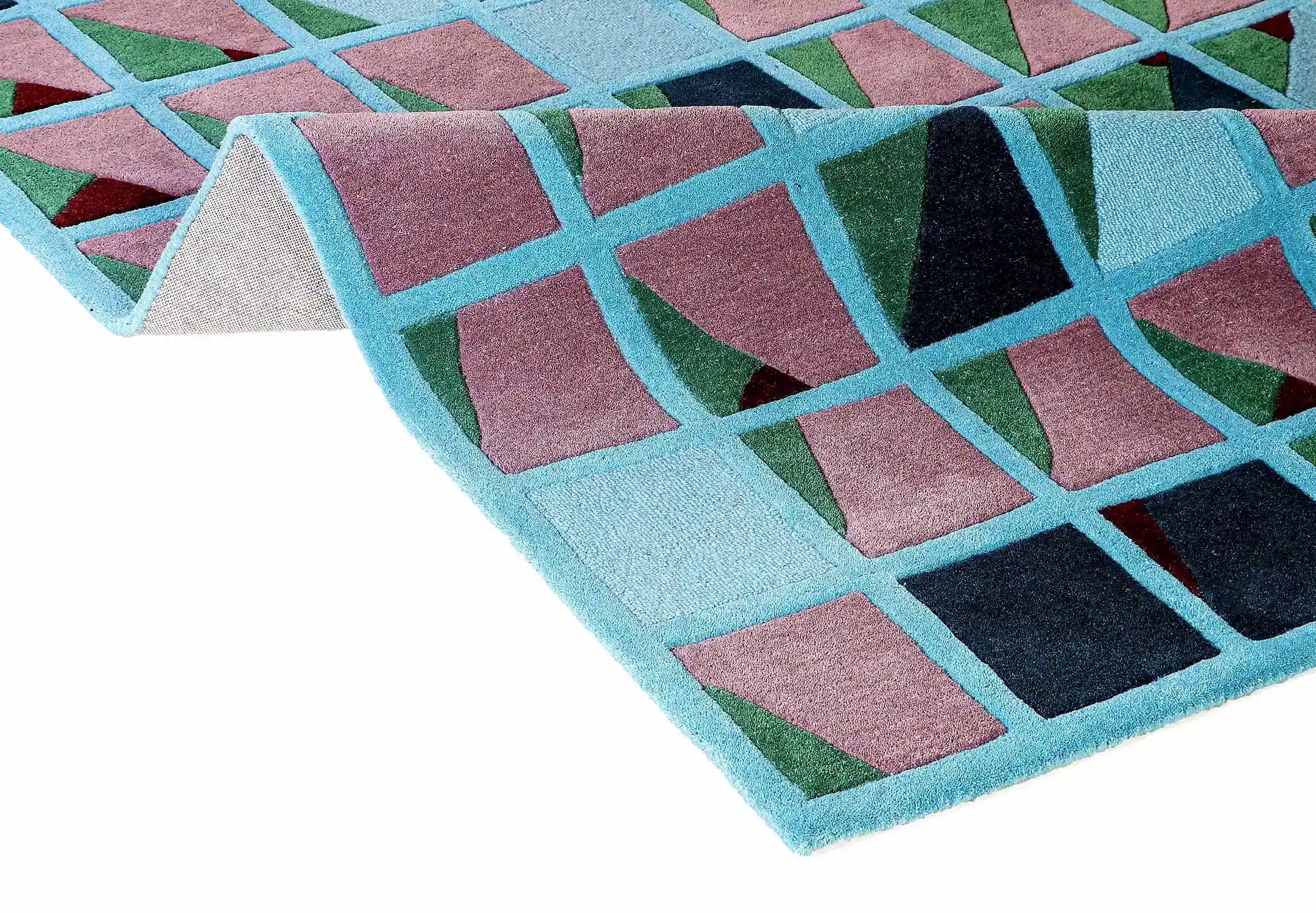 Geometric patterned rug with colorful squares