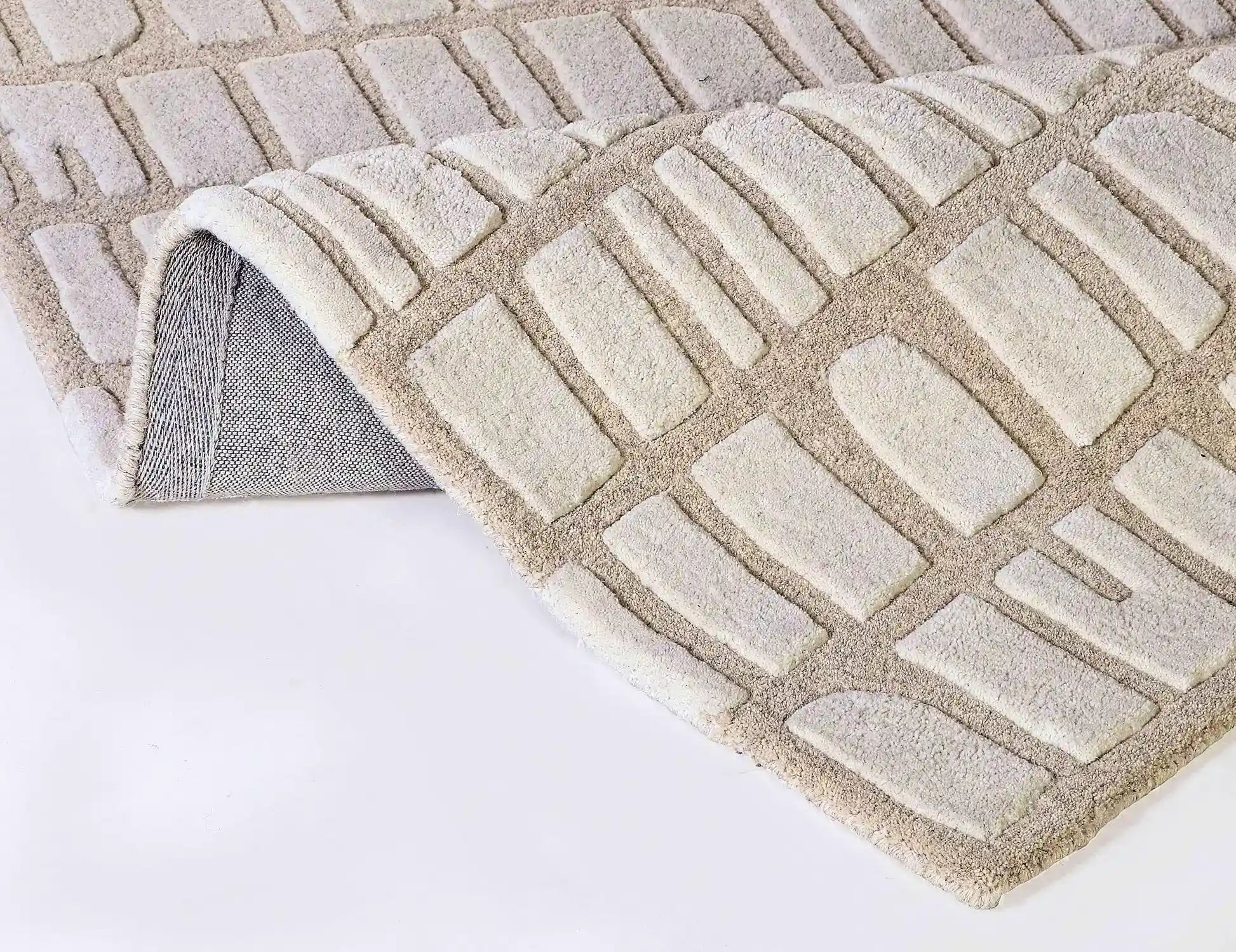 hand tufted textured wool area rug close up