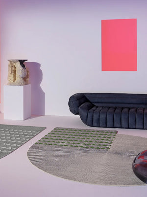 round shape hand tufted wool rug in modern living room