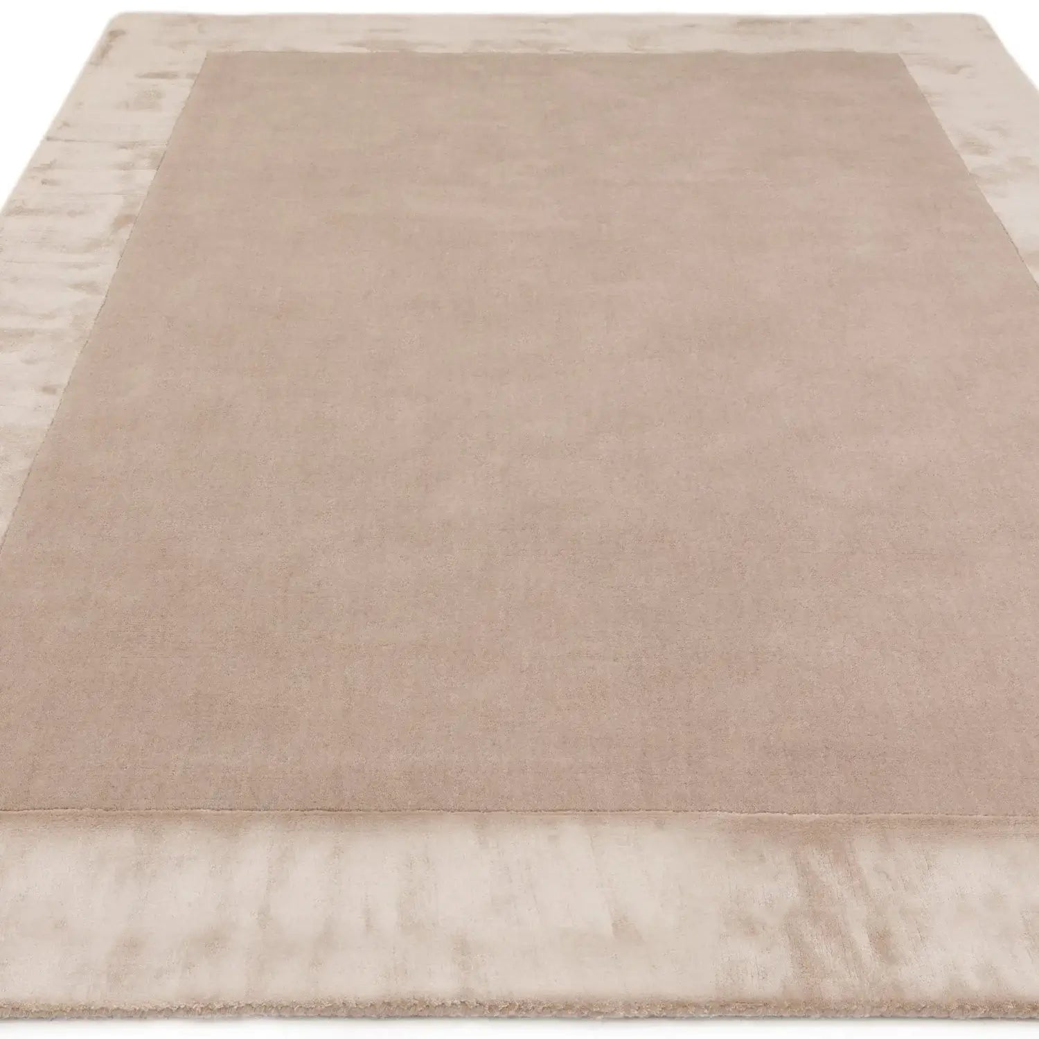 Beige area rug with a sheen border