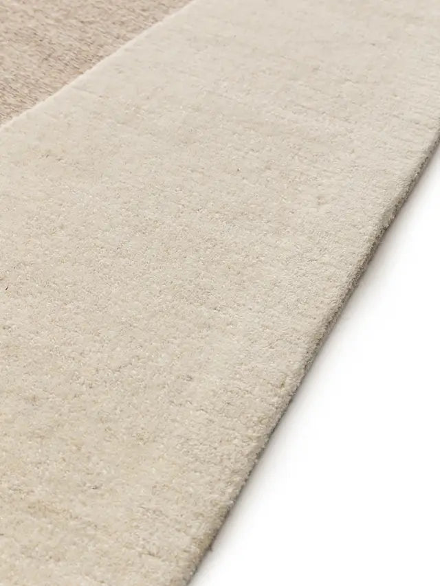 beige tufted wool rug pile height