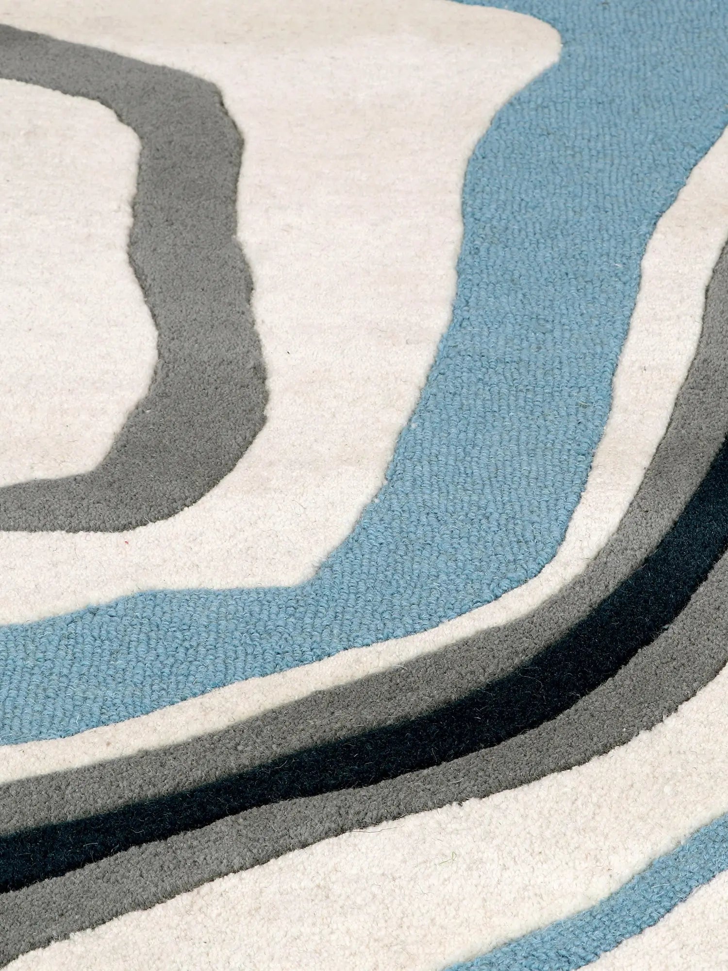 tufted wool area rug close up