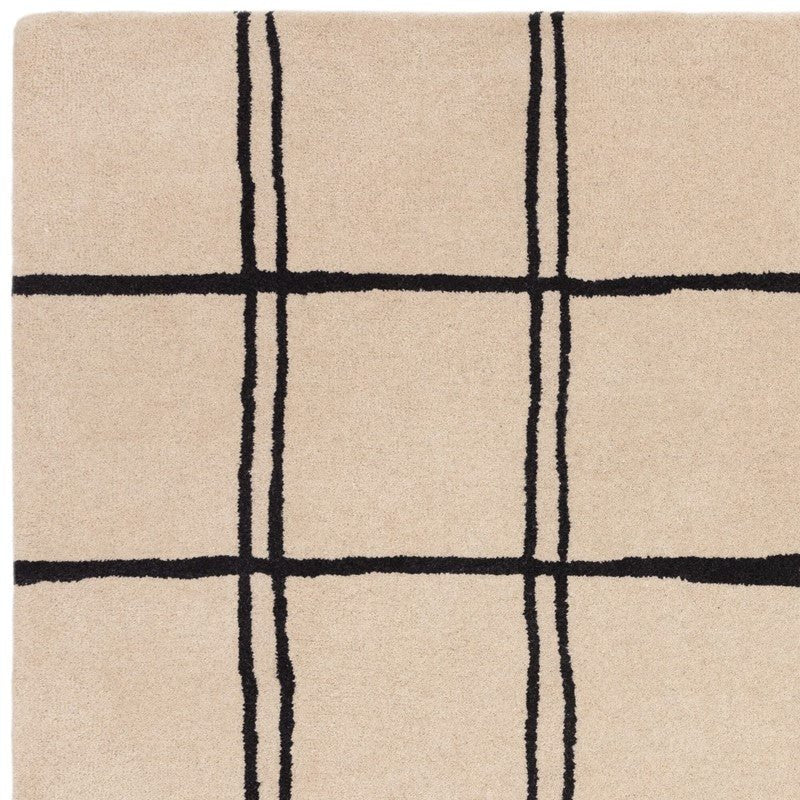 Beige rug with black grid pattern