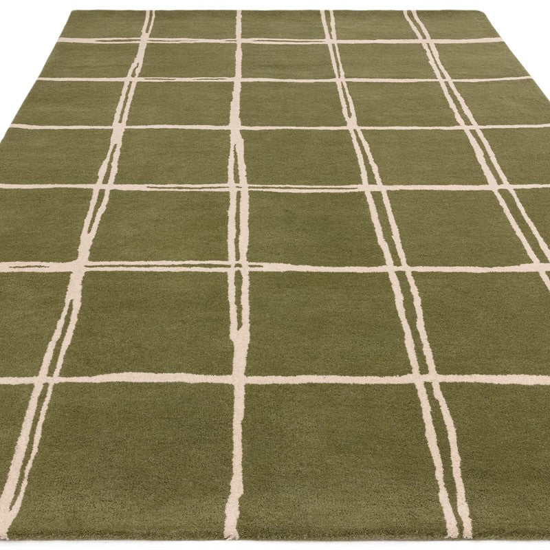 hand tufted green rug with beige grid pattern