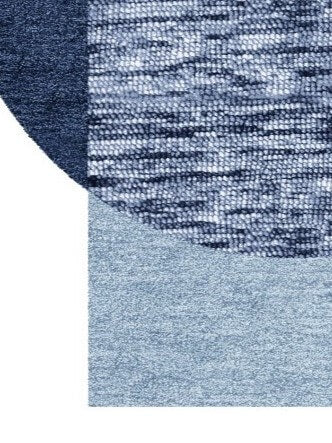 Close-up of blue wool rug with a textured pattern