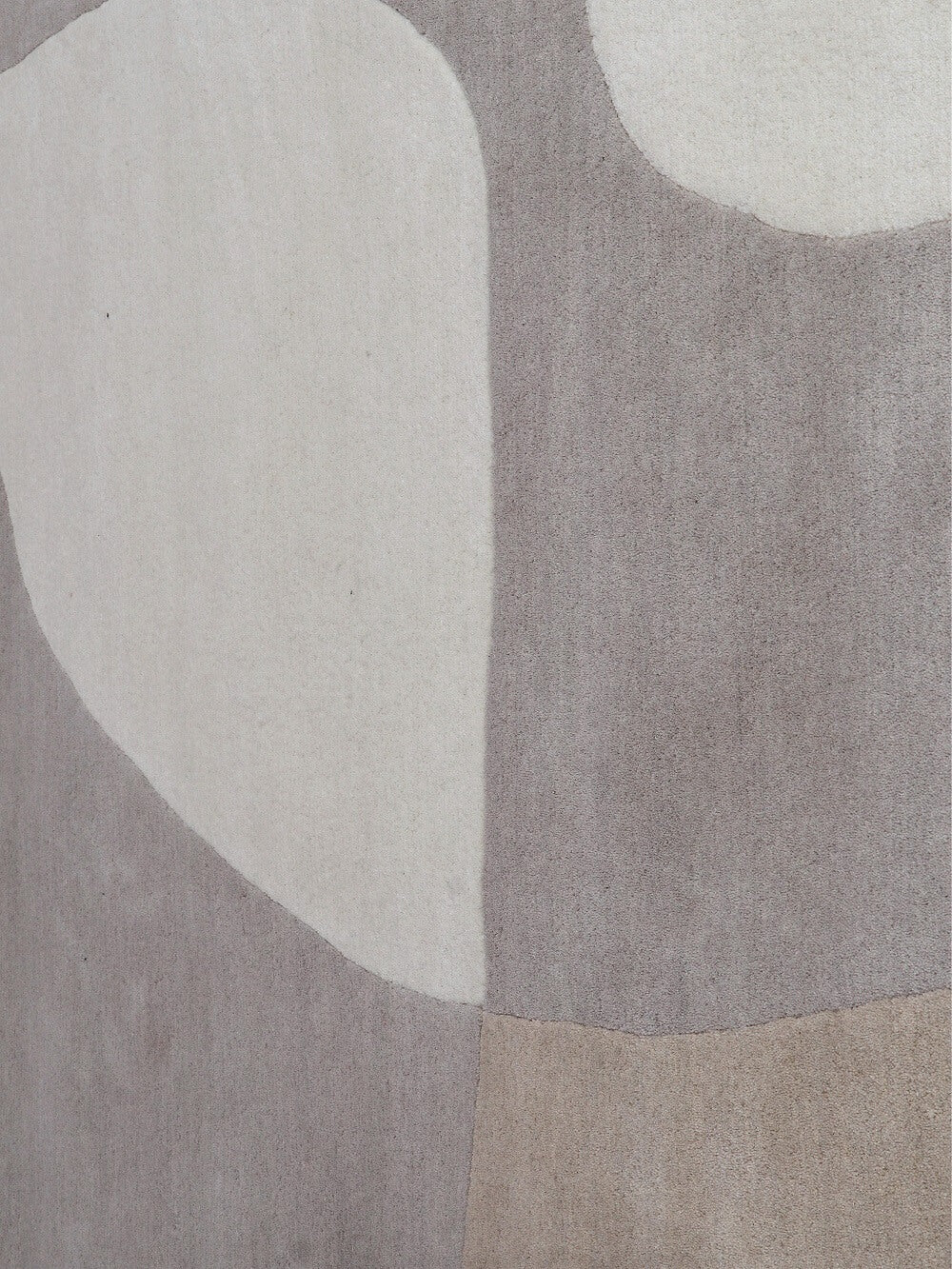 kura hand tufted wool shaped rug