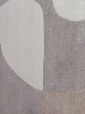 kura hand tufted wool shaped rug