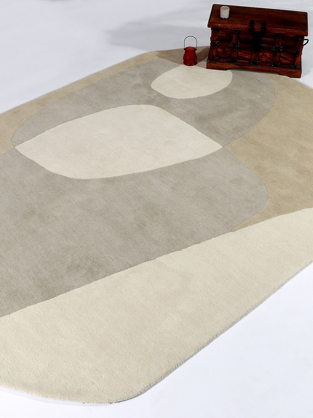Beige and brown abstract patterned rug