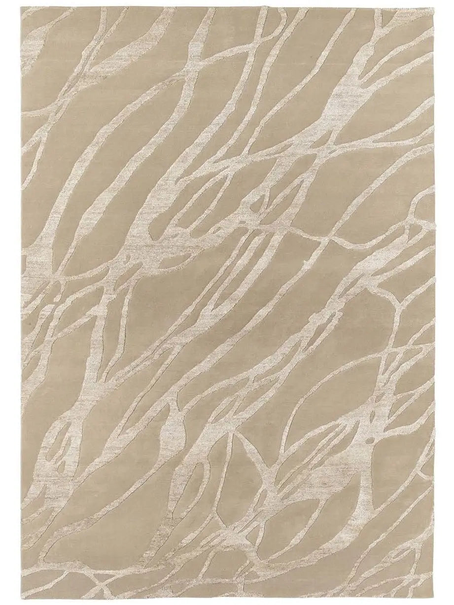 Beige hand-tufted area rug with abstract pattern