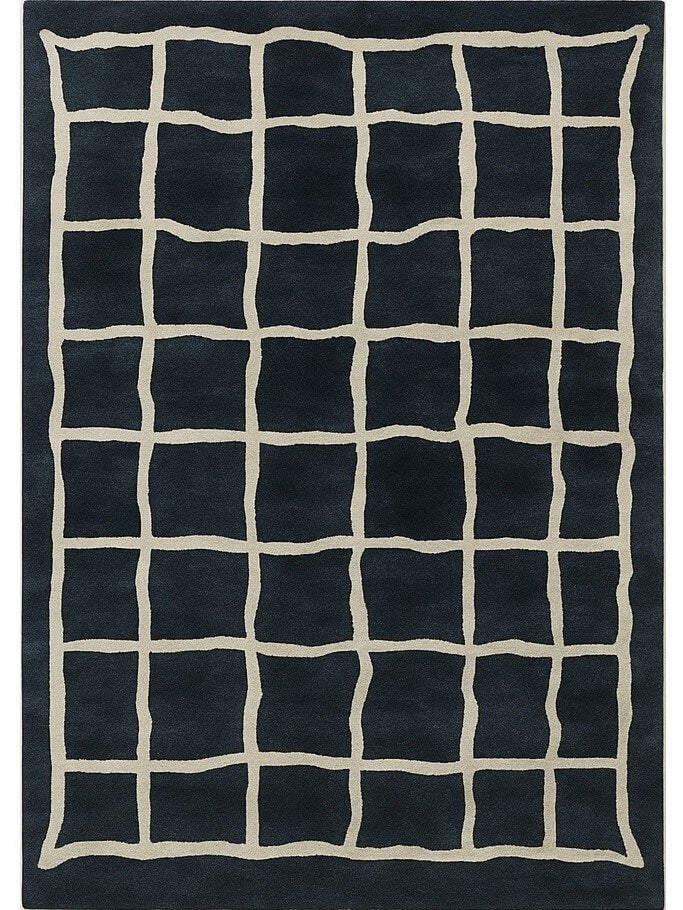 hand tufted black rug with beige grid pattern made with wool and viscose