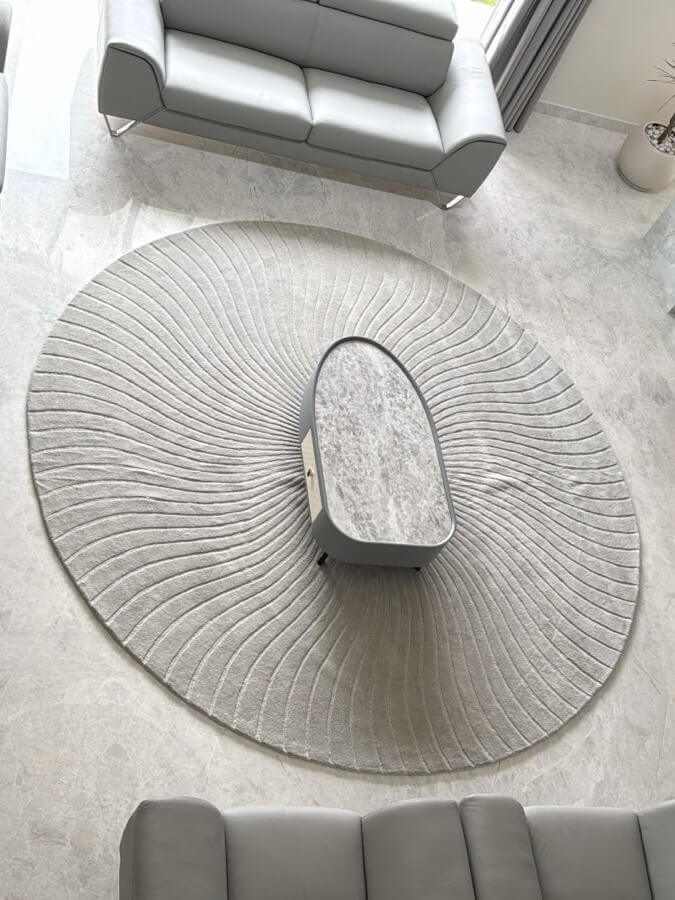 grey hand tufted round wool rug