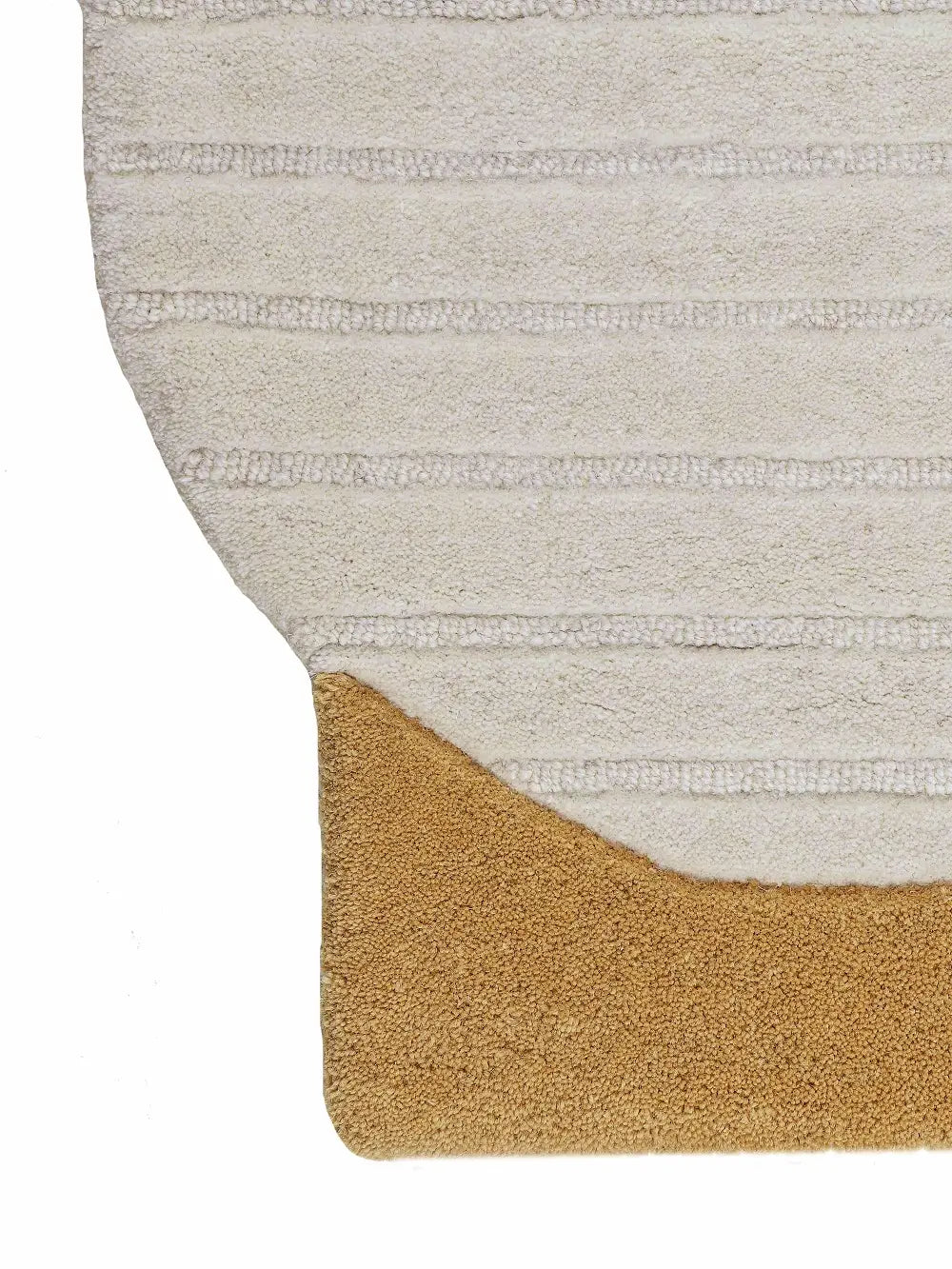 textured tufted wool rug corner