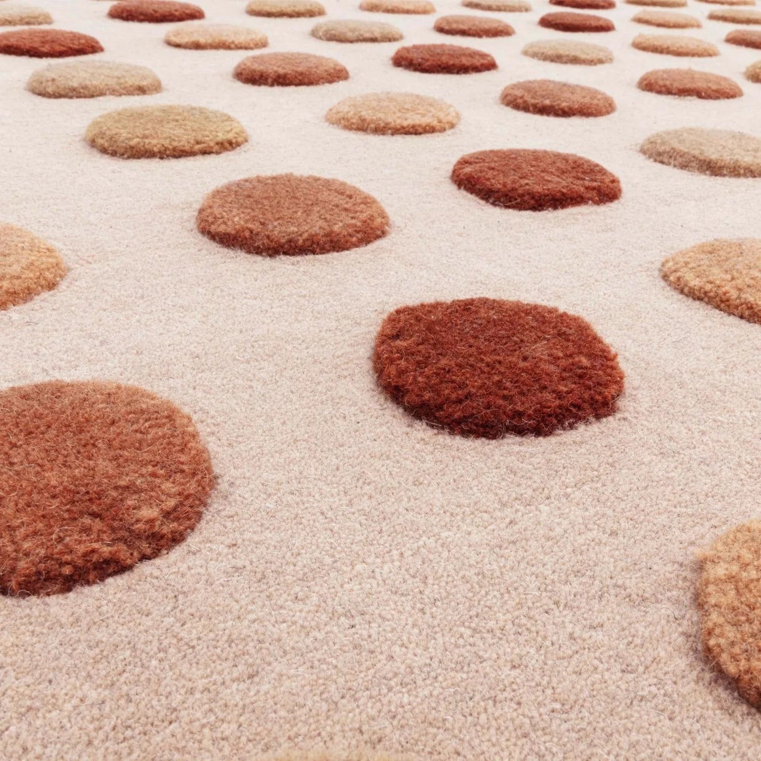 Patterned carpet with circular brown and beige shapes