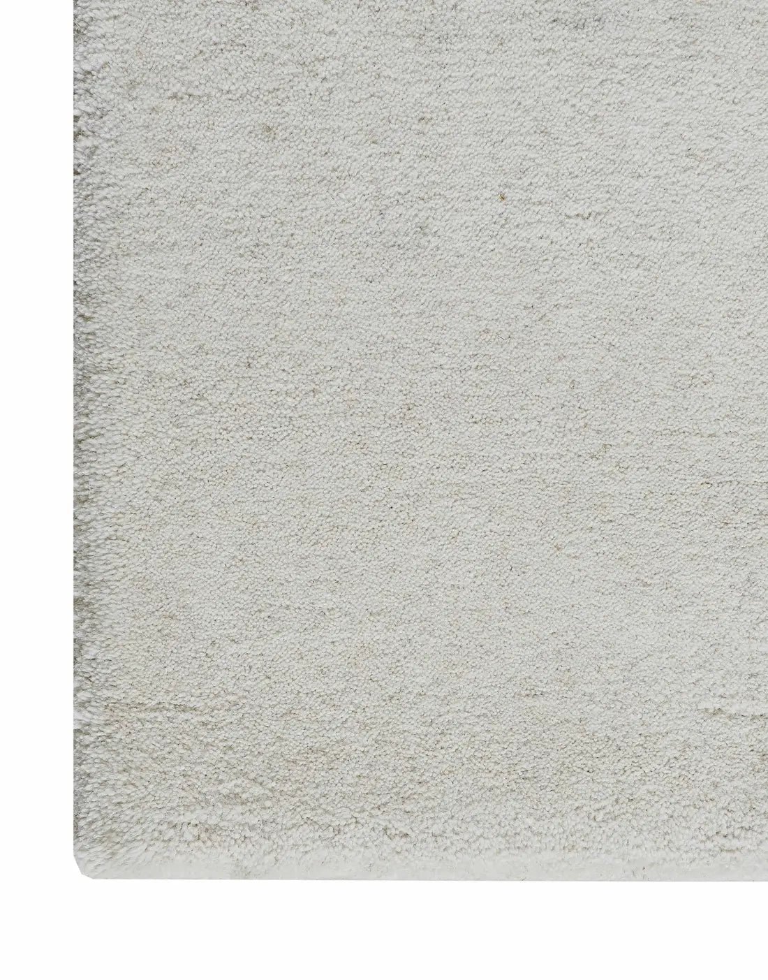 hand tufted white wool rug corner