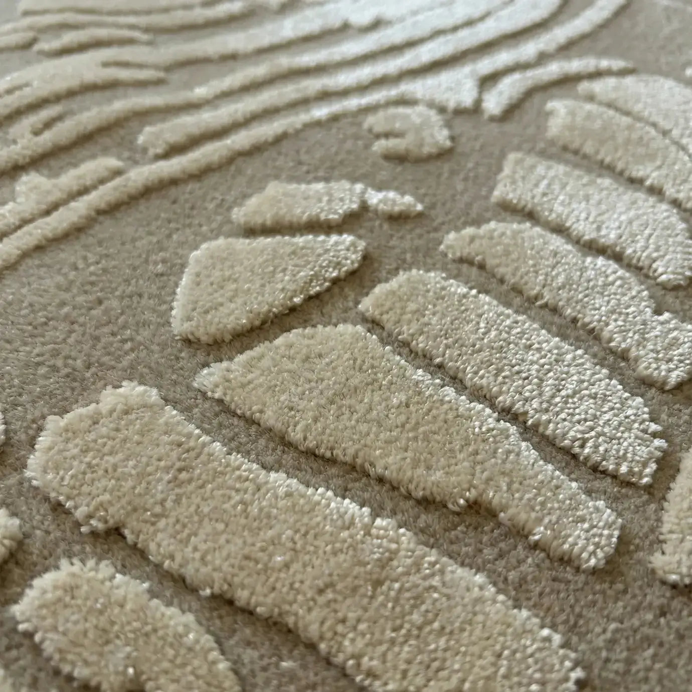 Close-up of textured beige carpet