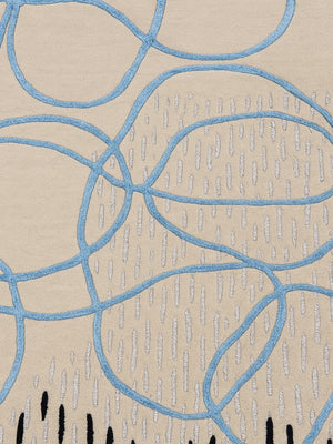 close view of hand tufted wool and viscose rug