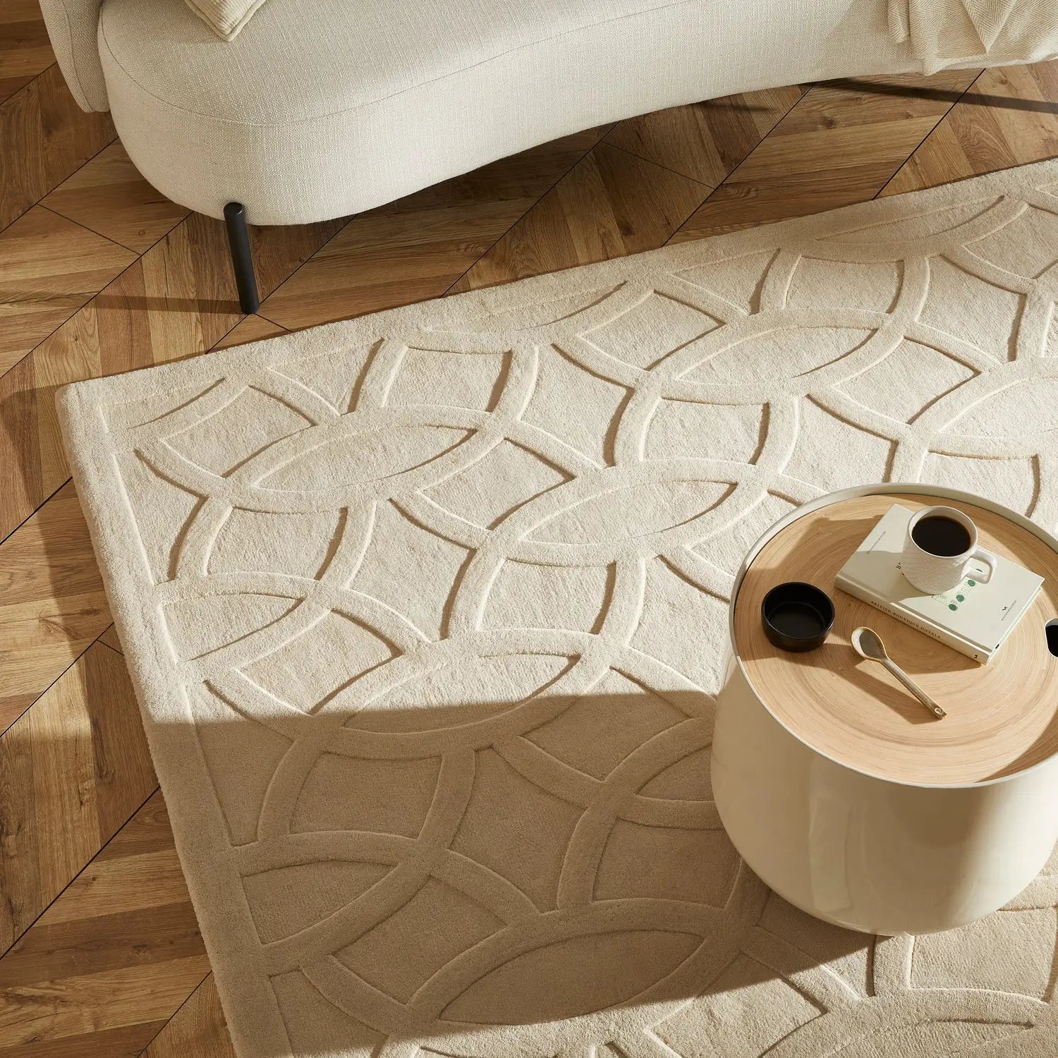 Beige textured rug with geometric pattern